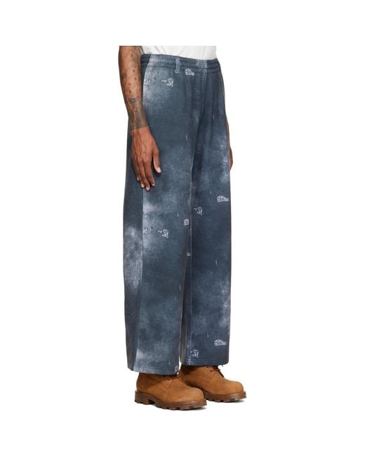 we11done Blue Trompe L'Oeil Denim Printed Sweatpants for men