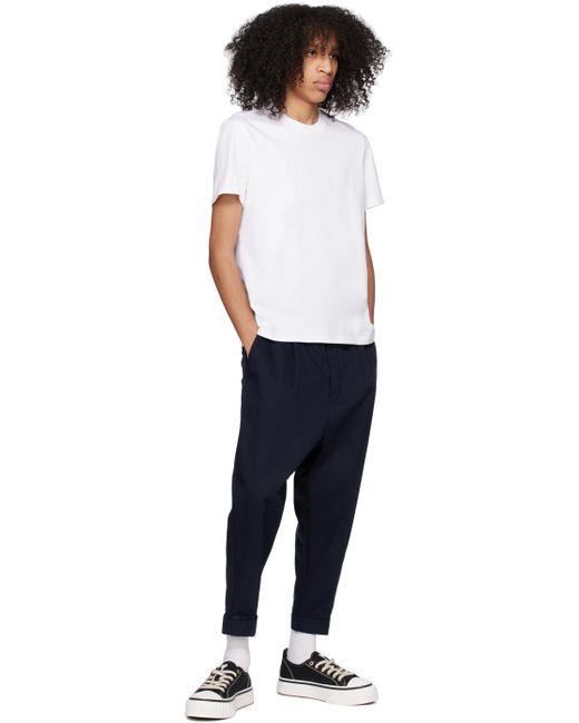 AMI Blue Navy Carrot Trousers for men
