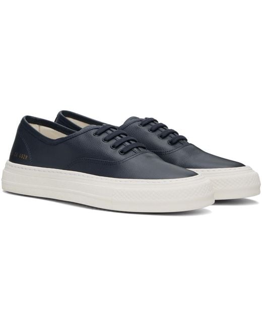 Common Projects Black Four Hole Sneakers for men