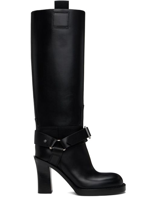 Bottes hauteur genou noires en cuir à bride de style sous-pied Burberry en coloris Black