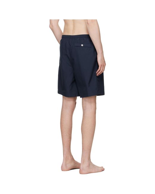 AMI Blue Long Plain Swim Shorts for men