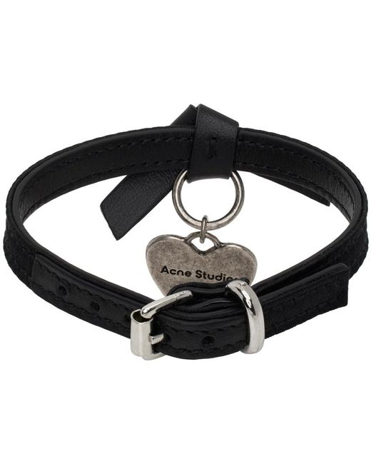 Bracelet noir à breloque et à nœud musubi Acne en coloris Black