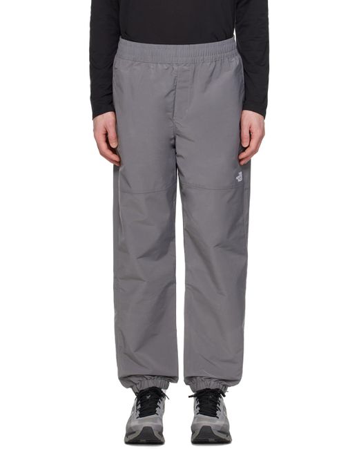 Pantalon de survêtement coupe-vent tnfTM gris à taille élastique The North Face pour homme en coloris Black