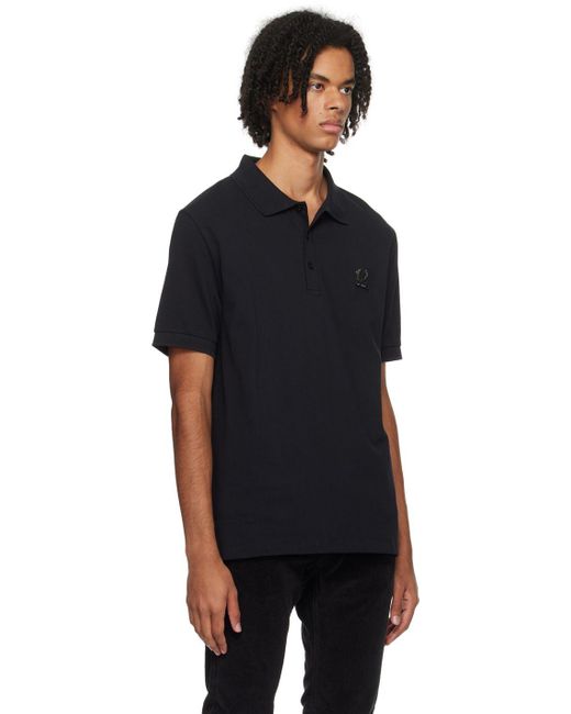 Fred perry best sale raf simons polo