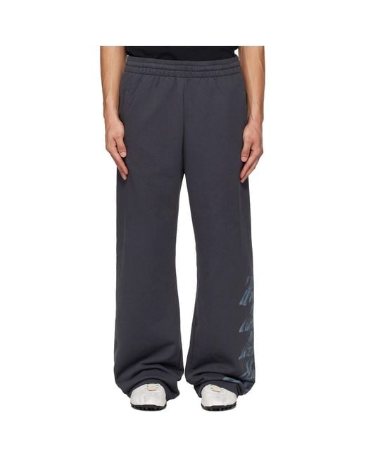 we11done Blue Multi-Logo Sweatpants for men