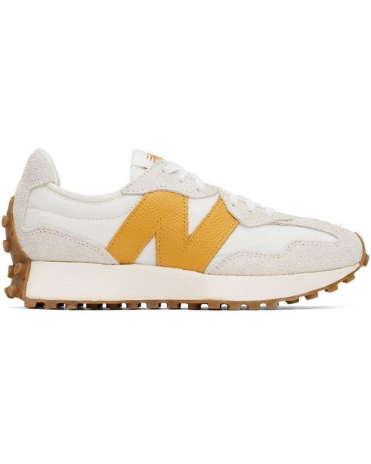 new balance 327 sneakers in off white with yellow detail