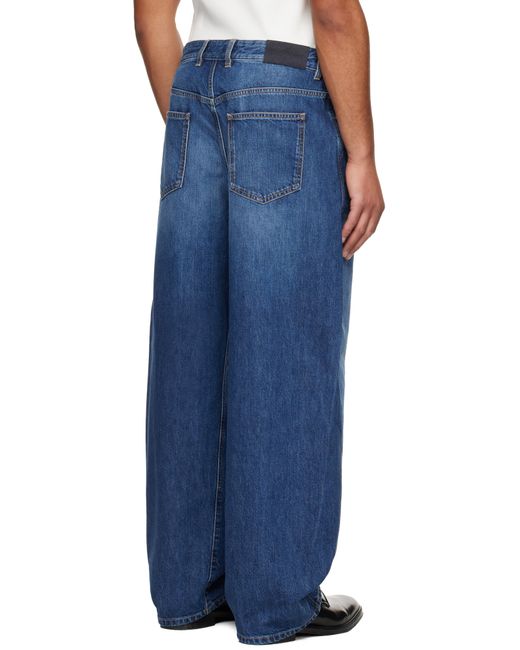 Jean Bleu En Denim À Effet Délavé Et À Coutures Extérieures Incurvées Givenchy pour homme en coloris Blue