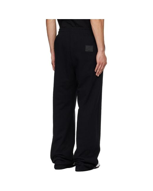 we11done Black Sweatpants for men