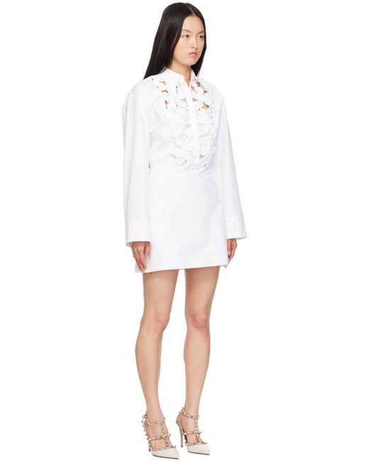 Robe courte blanche à appliqués floraux brodés Valentino en coloris Black