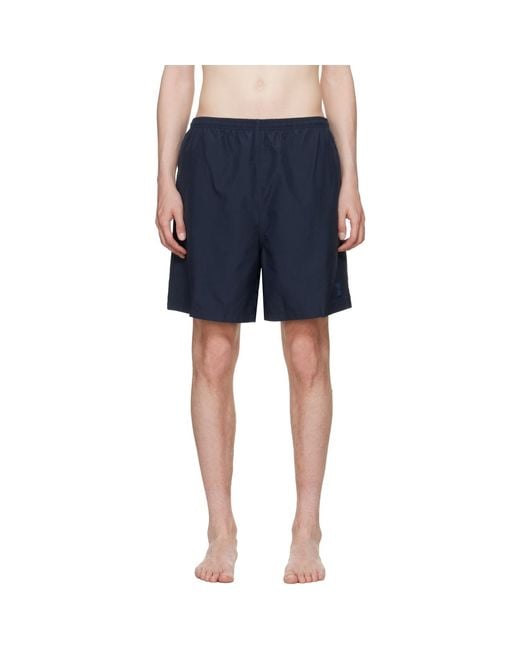 AMI Blue Long Plain Swim Shorts for men