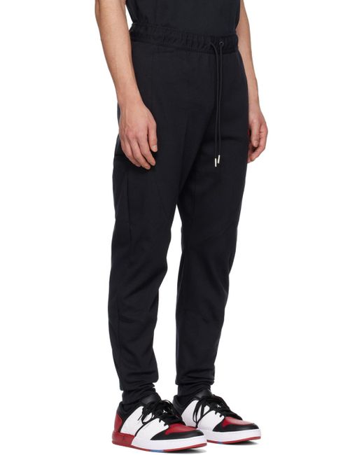 Nike Black Essentials Warm Up Sweatpants for men