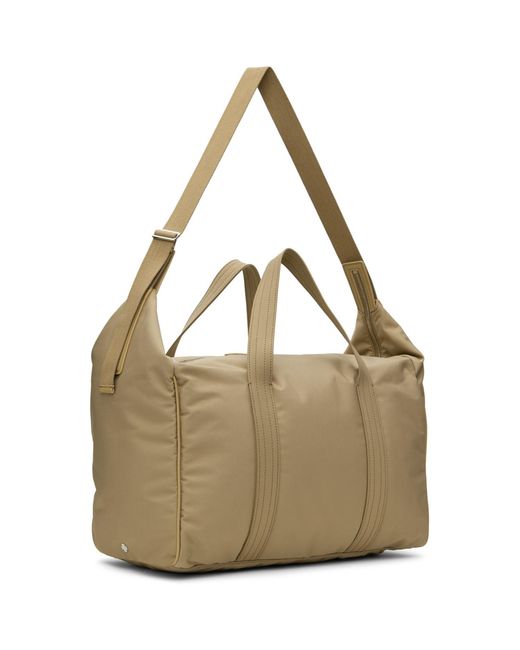 The Row Metallic Beige Logan Duffle Bag for men