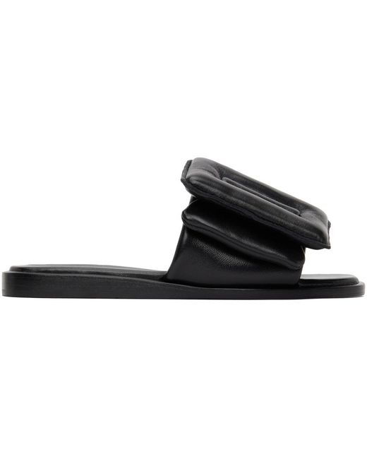 black puffy sandals