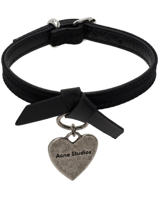 Bracelet noir à breloque et à nœud musubi Acne en coloris Black