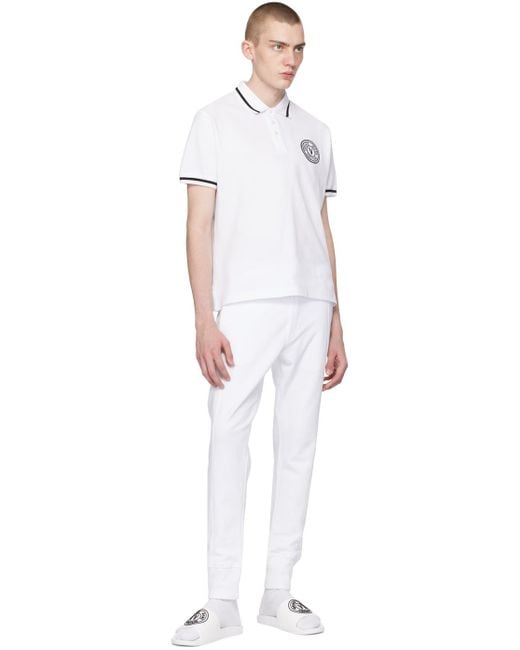 メンズ Versace ホワイト ロゴ刺繍 ポロシャツ White