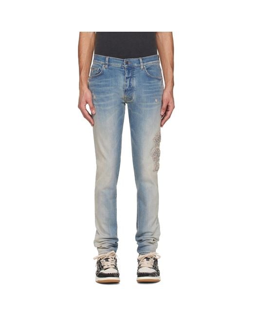 Amiri Blue Ma Quad Applique Skinny Jeans for men
