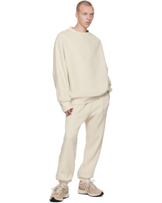 Off-White Relaxed Lounge Pants by Fear of God ESSENTIALS on Sale