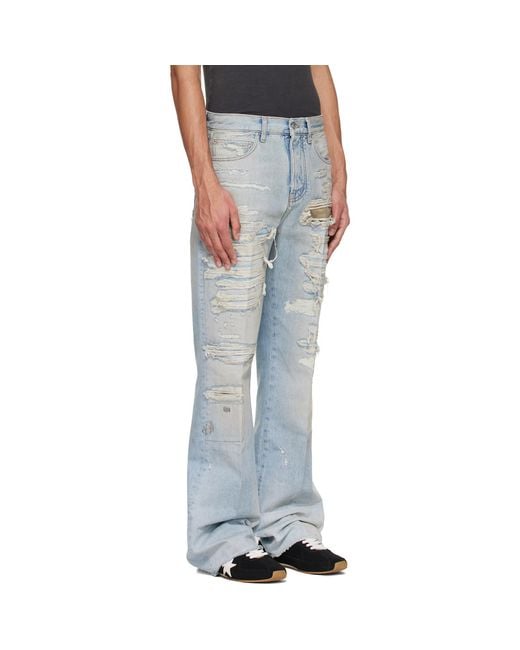 Amiri Black Camo Repair Boot Cut Jeans for men