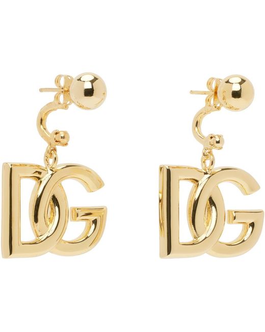 Boucles d'oreilles dorées à logo Dolce & Gabbana en coloris Metallic
