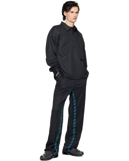 ASICS NOVALIS” STYRAX TRACK PANTS BLACK STYRAX TRACK PANTS | Unisex | Anthracite | Unisex ASICS