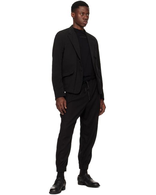 The Viridi-anne Black Garment-Dyed Blazer for men