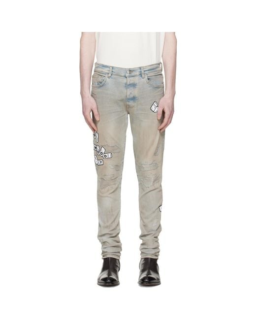 Amiri White Domino Appliqué Skinny Jeans for men