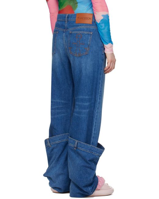 Jean bleu à revers prolongés exclusif à ssense J.W. Anderson en coloris Blue
