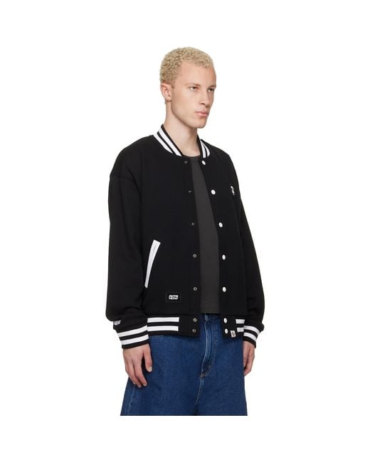 Aape By A Bathing Ape Black 'Aapenow' Moonface Varsity Jacket for men