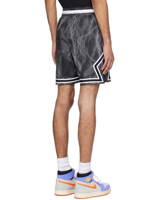 Short de sport noir à motif graphique et à garnitures à rayures Nike pour homme en coloris Blue