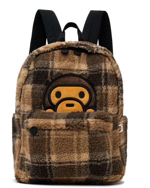 baby milo mini fur backpack FAUX MEDIUM This Sherpa fur mini backpack from BABY MILO STORE features a plush material and a cute Milo face design Other Bape BABY MILO MINI