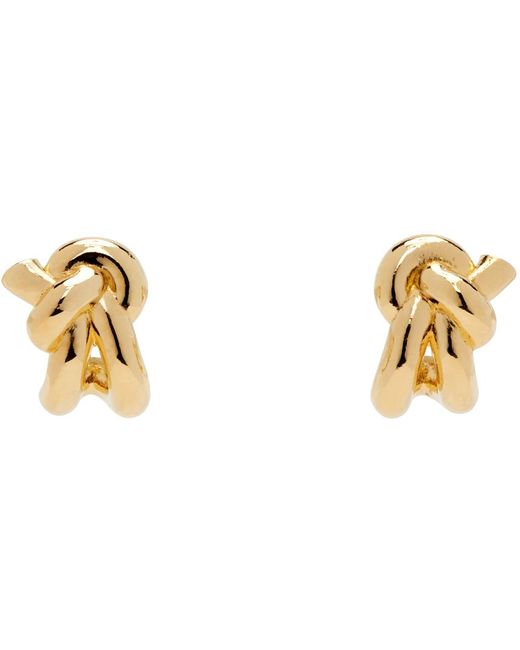 Boucles d'oreilles dorées à nœud emblématique Bottega Veneta en coloris Black