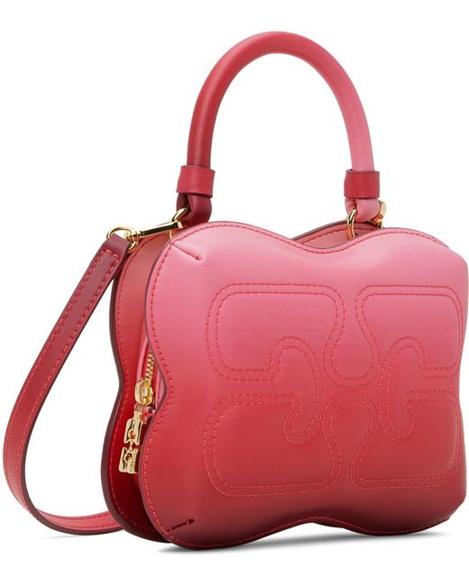 Petit sac à bandoulière rose à effet dégradé et à logo papillon Ganni en coloris Pink
