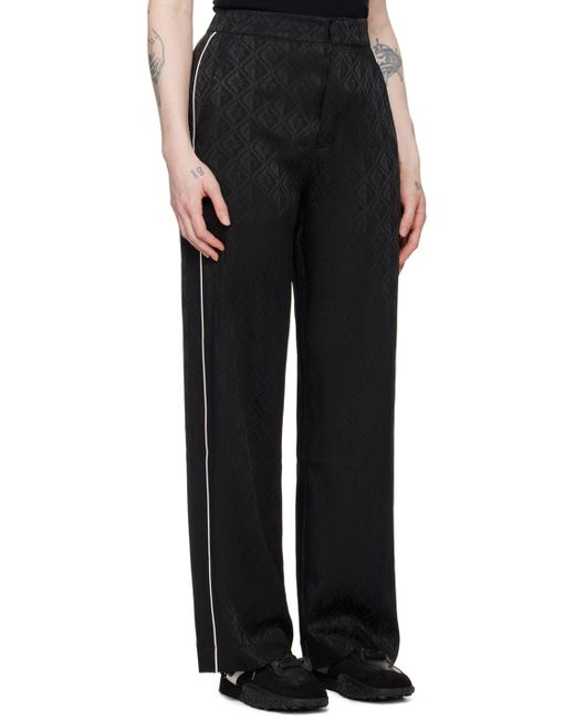 Pantalon noir à motif à logo en tissu jacquard MARINE SERRE en coloris Black