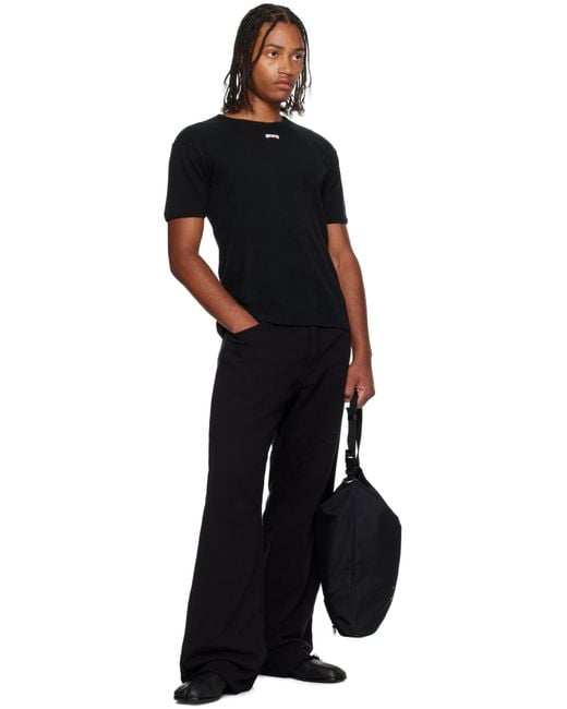 Maison Margiela Black High Tech Roll Up Backpack for men