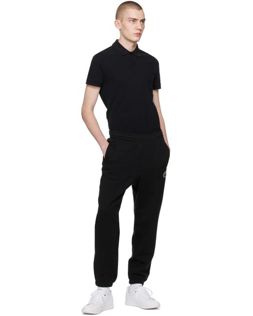Pantalon de survêtement noir à écussons à logo Lacoste pour homme en coloris Black