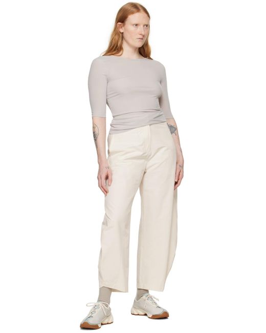 Amomento Natural Off- Curved Leg Trousers