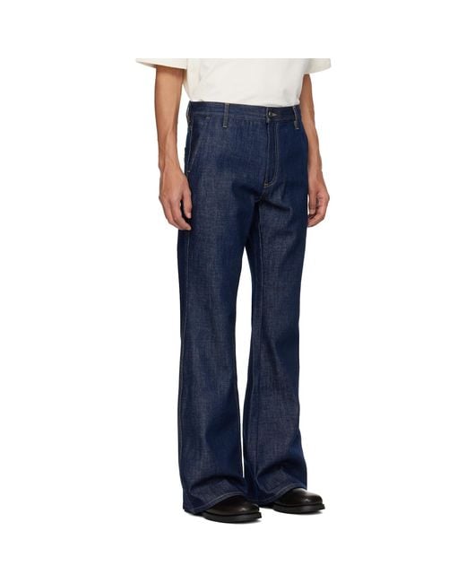 Amiri Blue Raw Boot Cut Jeans for men