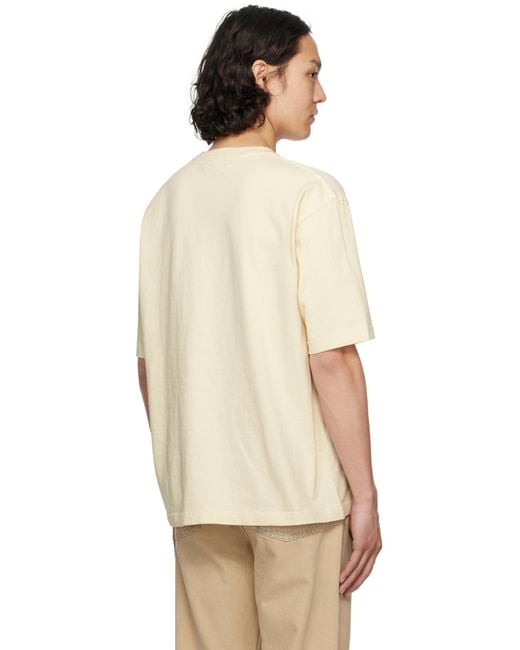 【関税込み】Ambush オフホワイト 'Slow & Steady' Tシャツ メンズ Ambush オフホワイト 'Slow & Steady' Tシャツ