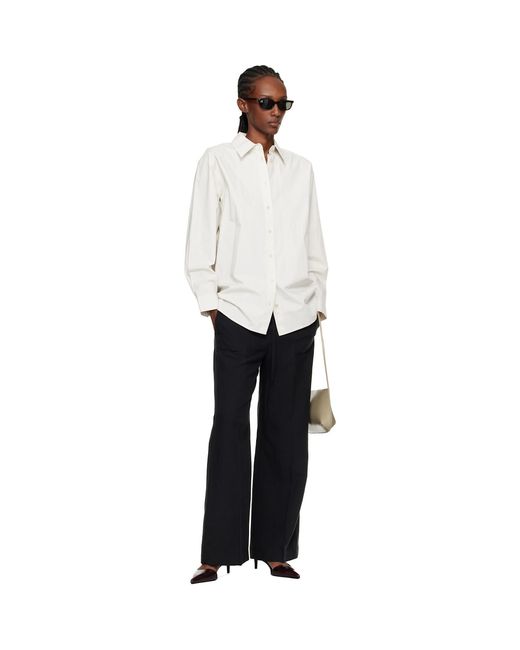 Totême Black Fluid Drawstring Trousers