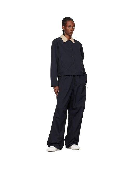 On Shoes Blue Coach Jacket