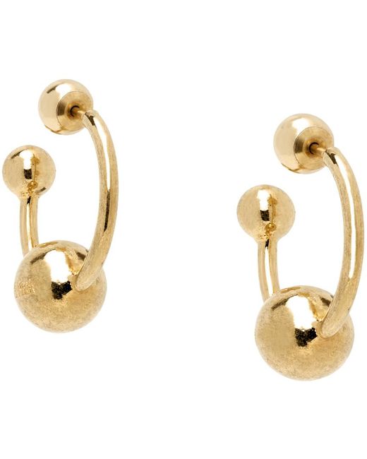 Boucles d'oreilles de style perçage dorées Jean Paul Gaultier en coloris Black