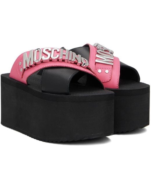 Sandales compensées noir et rose à ferrure à logo Moschino en coloris Black