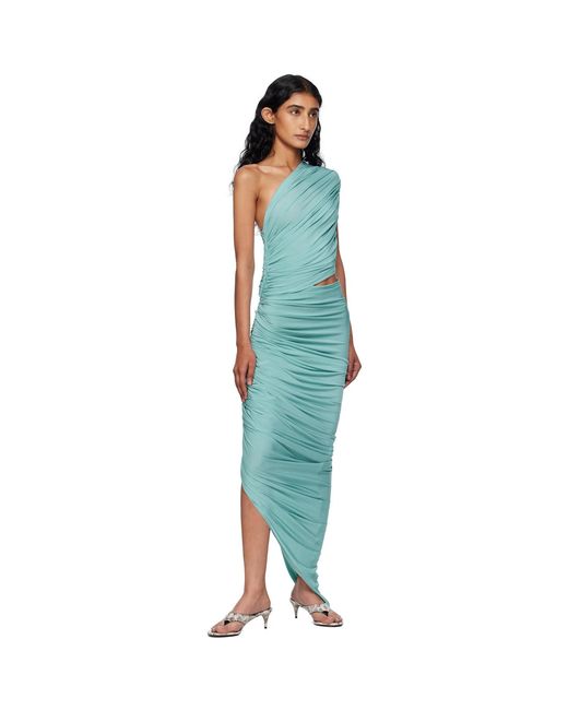 alaia maxi dress Alaa Skirt Draped Black jersey thats gathered at the halter neckline and has sweeping back panels. Jersey crossover Dress 38