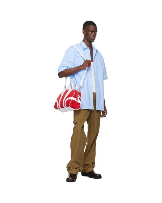 Dries Van Noten Red Suede Duffle Bag for men