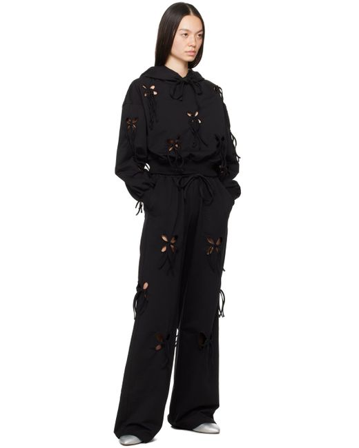 Pantalon de détente noir à découpes graphiques JKim en coloris Black