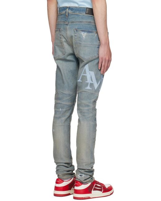 Amiri Blue Staggered Jeans for men