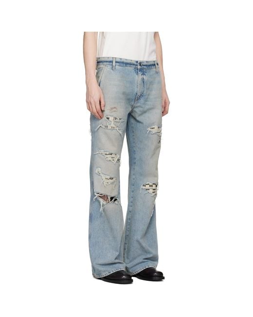 Amiri Blue Checkered Repair Bootcut Jeans for men