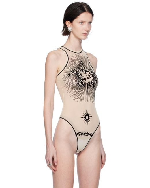 https://cdna.lystit.com/520/650/n/photos/ssense/611969d6/jean-paul-gaultier-Nude-Flocked-Bodysuit.jpeg