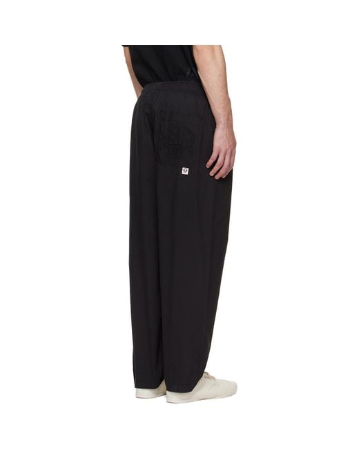 Aape By A Bathing Ape Black 'Aape Now' Woven Trousers for men