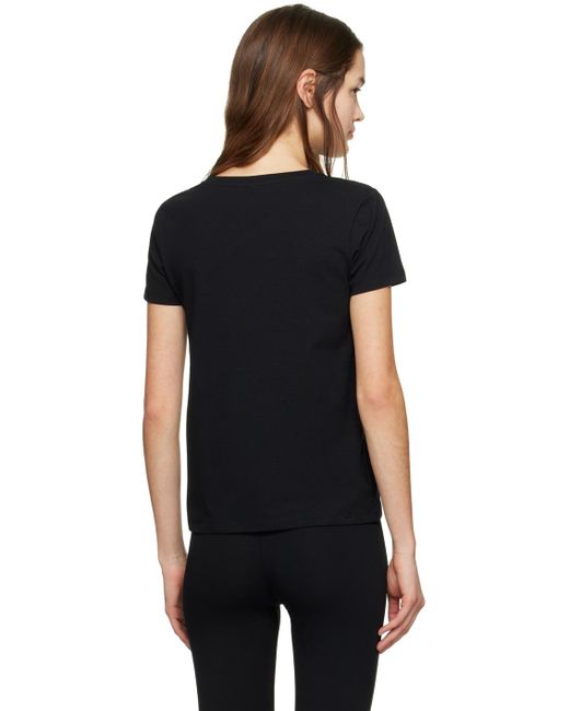 T-shirt noir à appliqués à logo Moschino en coloris Black